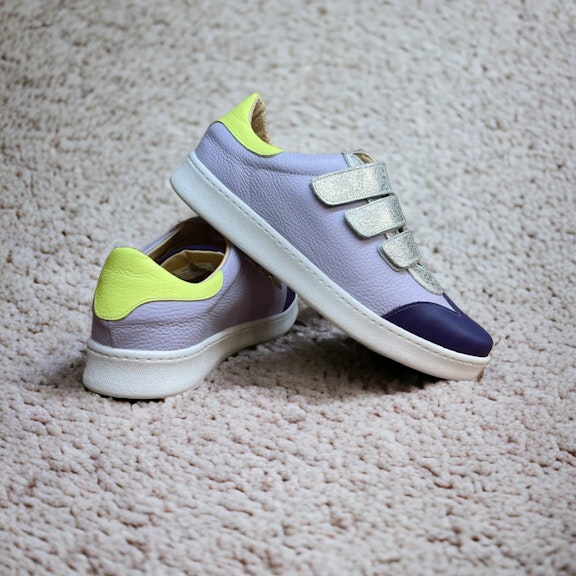 Sneakers Vitti Malaga. Sneaker made 100% of leather. Toe cap in smooth violet leather. Sides in smooth lilac leather. FasteSneaker made 100% of leather. Toe cap in smooth violet leather. Sides in smooth lilac leather. Faste...