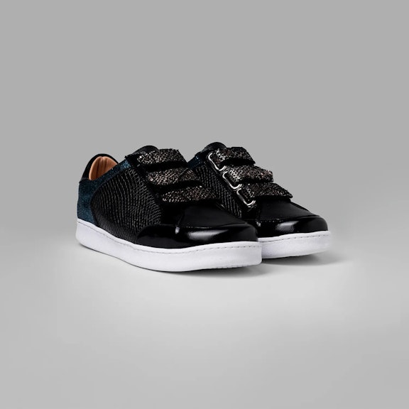 Sneakers Vitti Trelew. Black sneaker made 100% in cowhide leather. A mix of shiny, textured, and smooth black leathers. MetBlack sneaker made 100% in cowhide leather. A mix of shiny, textured, and smooth black leathers. Met...