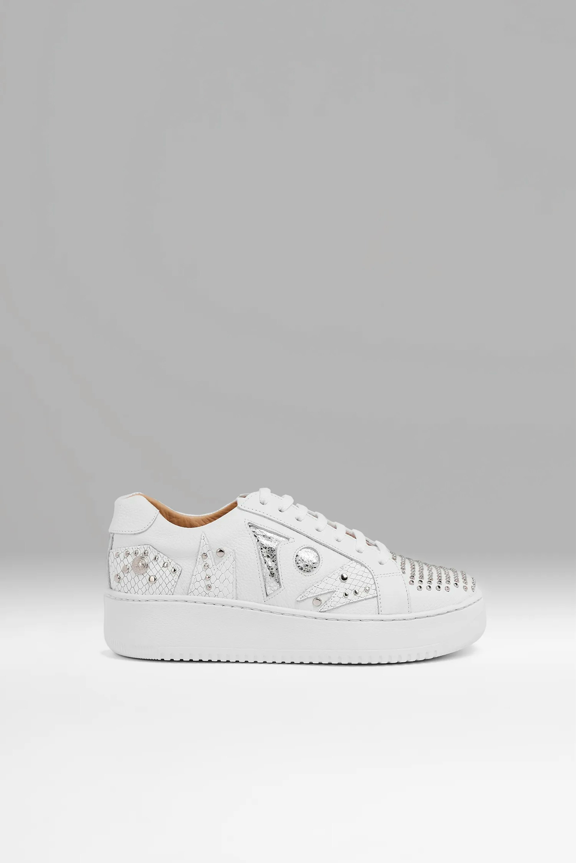Sneakers Vitti Mallorca. Low-top sneaker crafted in flawless white leather. Textured details enrich its surface, offering a tLow-top sneaker crafted in flawless white leather. Textured details enrich its surface, offering a t...